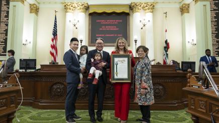 Asm. Wicks presents Dr. Morishita with framed resolution for his retirement on Assembly floor