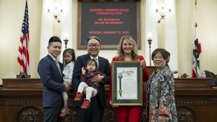 Asm. Wicks presents Dr. Morishita with framed resolution for his retirement on Assembly floor